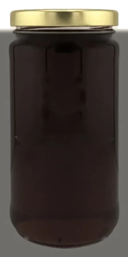 Buckwheat Honey honey in a one-pound glass jar